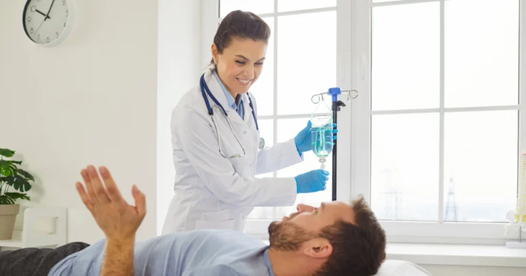 A doctor giving vitamin injections to a patient in Riverdale, UT hospital room